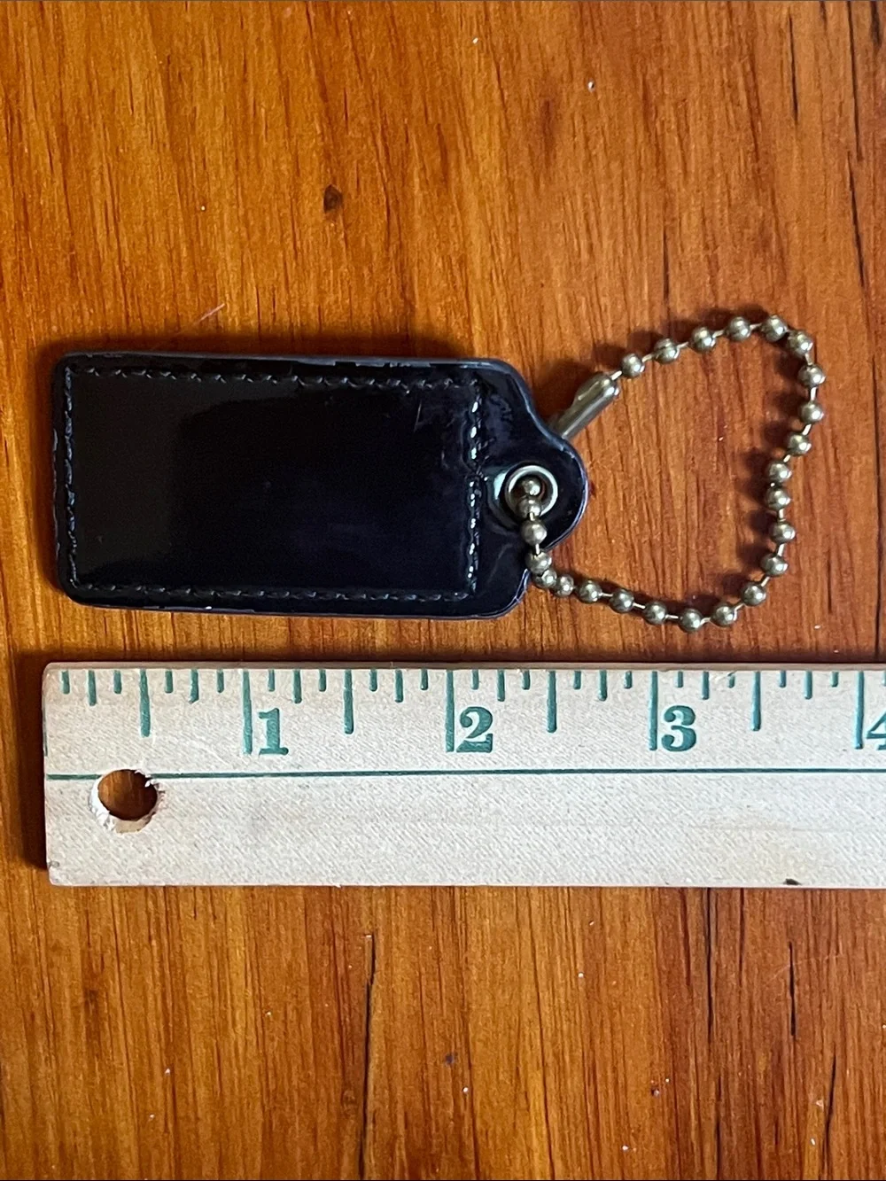 Coach attachment patent leather